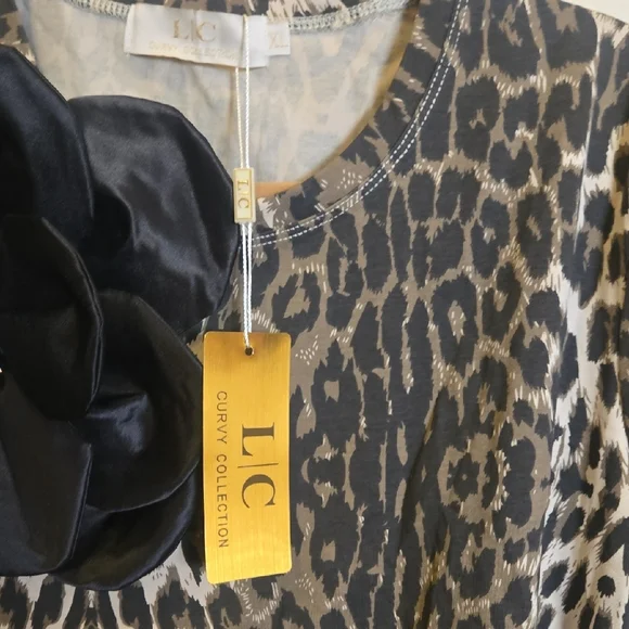 Elegant Leopard Print Blouse with Black Floral Detail - Picture 8 of 10